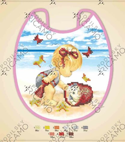 "Al mare". Bavaglino cucito con lo schema stampato